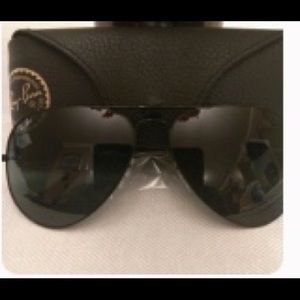 Ray Ban sun glasses.  58 mm.